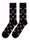 mitjons socksandco amb disseny nuvis i detall amigo del novio en color negre